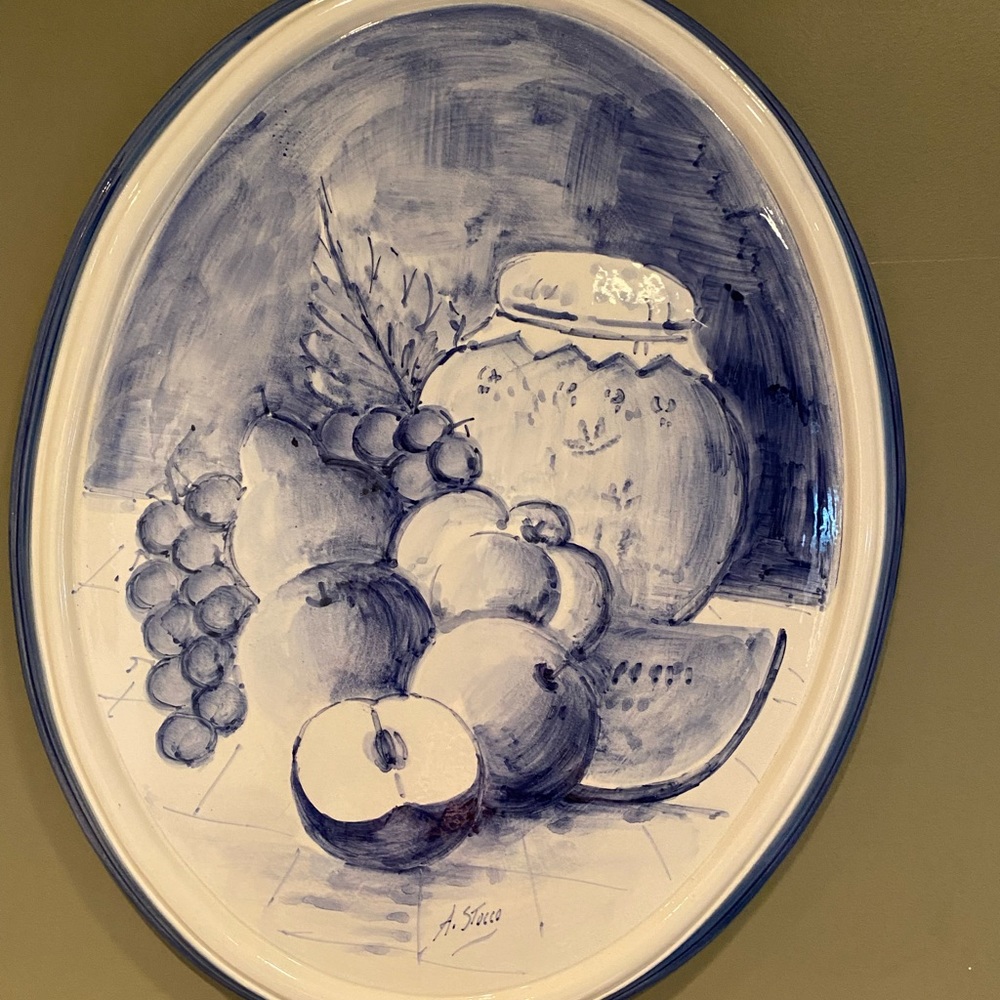 Hand painted wall plaque.